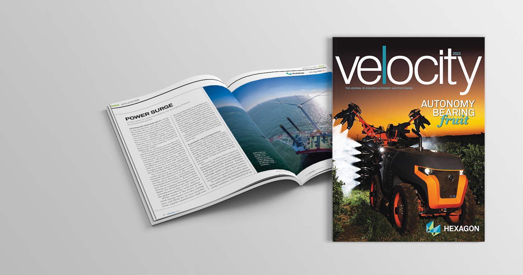 Velocity cover in front of an open copy of the magazine